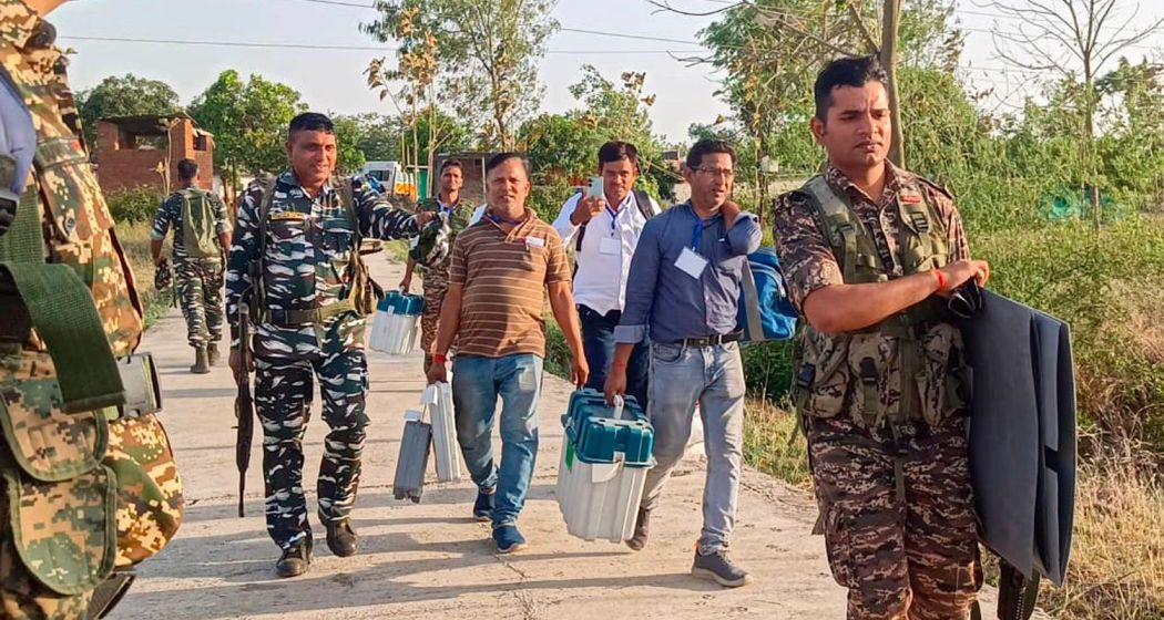  Polling officials and security personnel leave with election material from Imamganj after polling for the first phase of Lok Sabha elections, in Gaya district on Friday.
