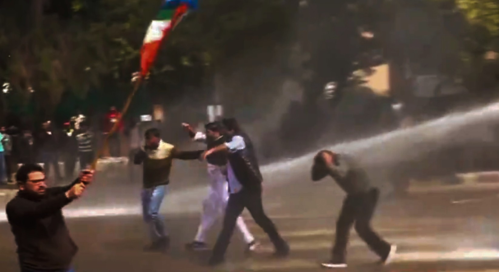 Police use water cannons to control NSUI members protesting near Sector 35.