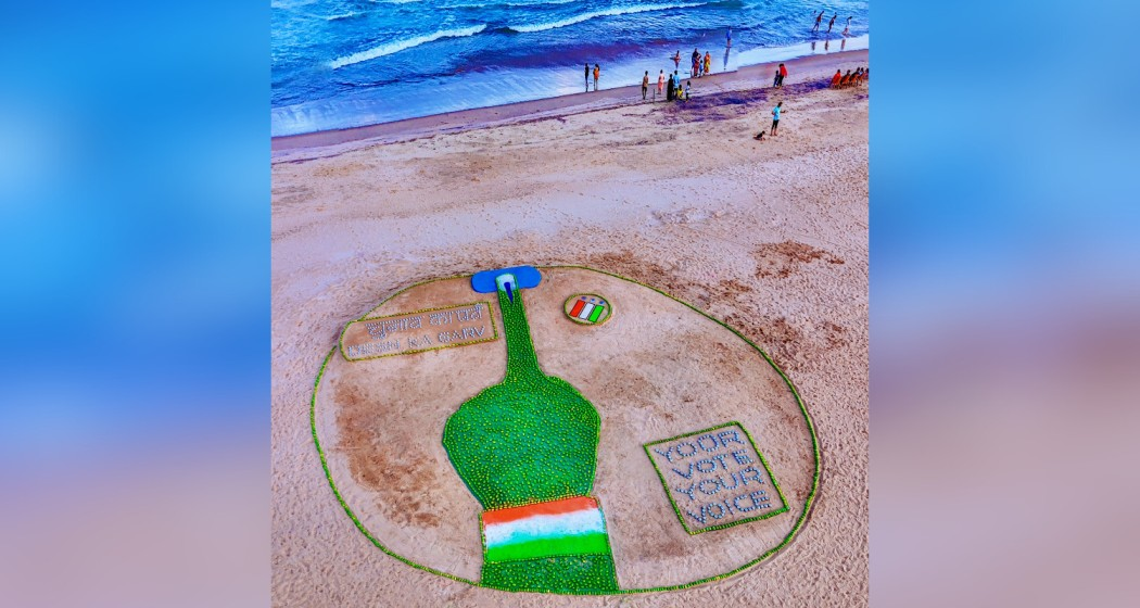 An aerial view of Pattnaik's sand art commemorating the ongoing Lok Sabha and Assembly elections across India.