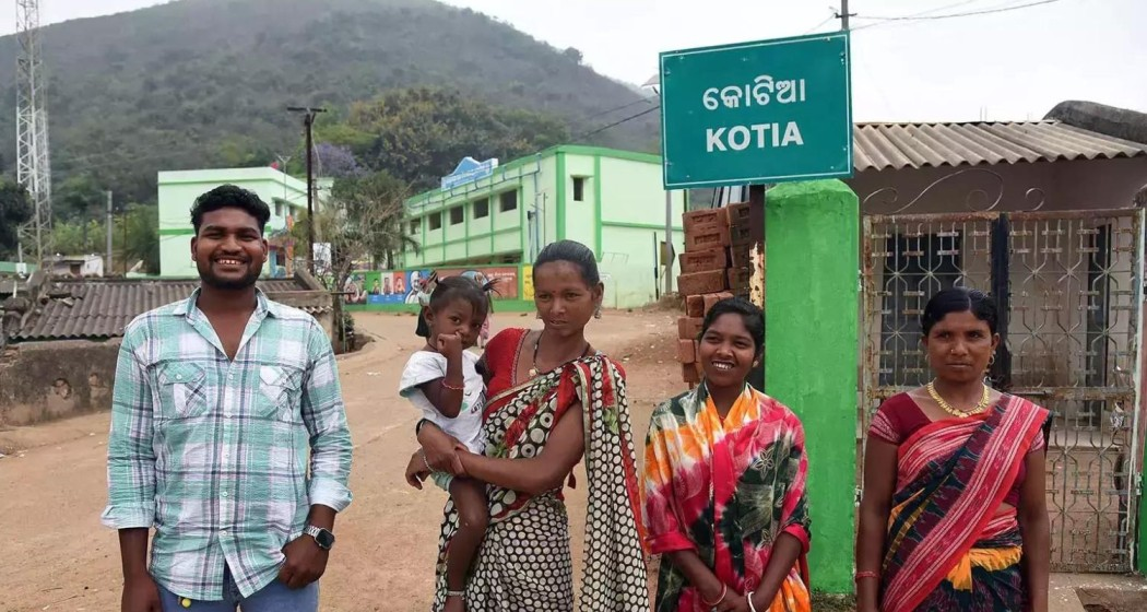 People pose for a picture at the Kotia gram panchayat, Koraput district in south Odisha. 