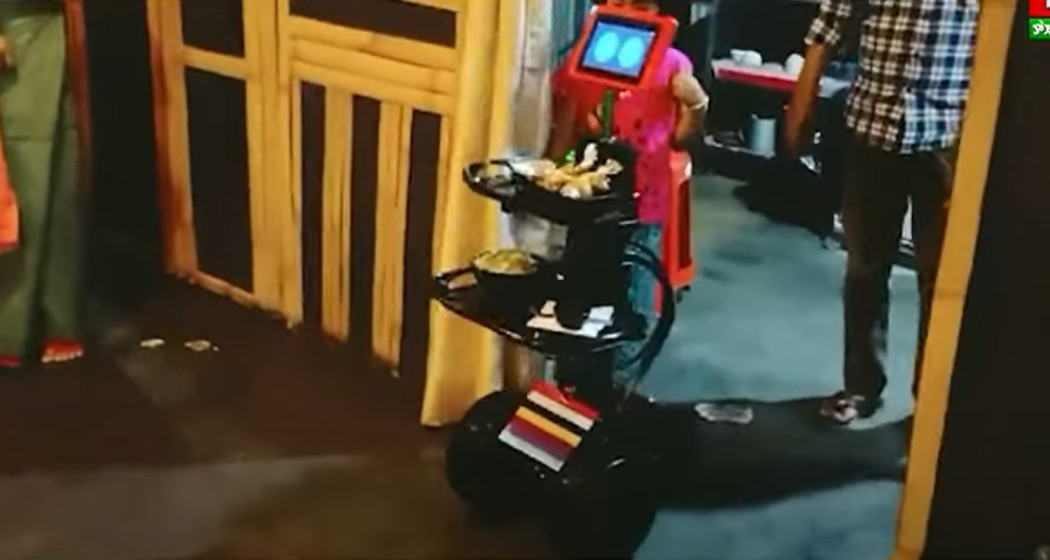 The robot conducting trials in a restaurant. 