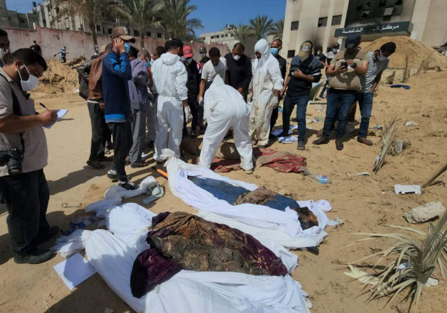 Dozens of decomposed bodies found buried at Nasser Hospital in Gaza after Israeli raid