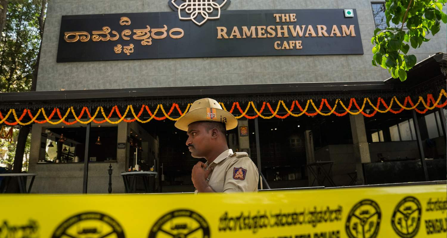 A policeman stands vigilant outside the damaged premises of the Rameshwaram cafe in Bengaluru.