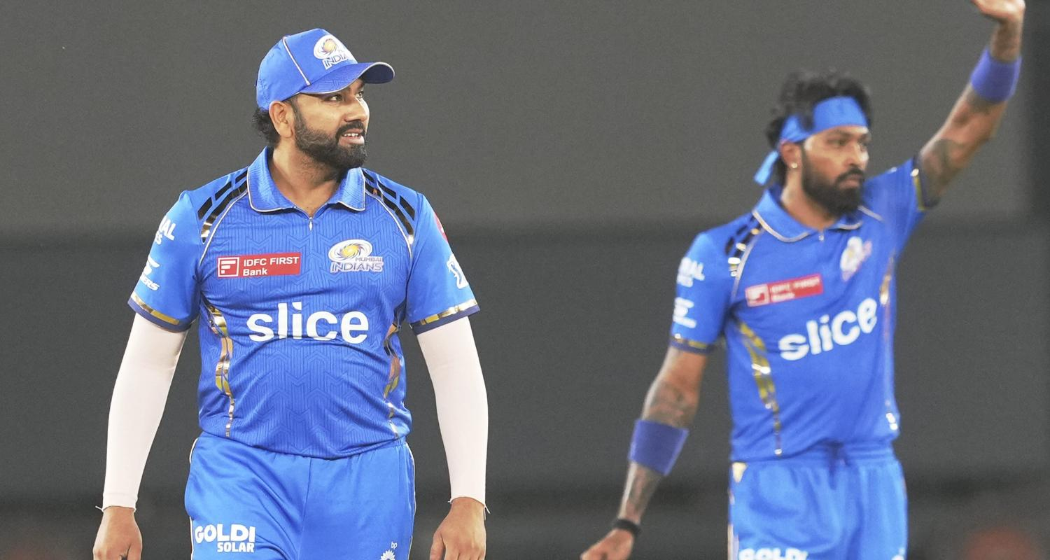 Former Mumbai Indians captain Rohit Sharma with the new skipper Hardik Pandya.