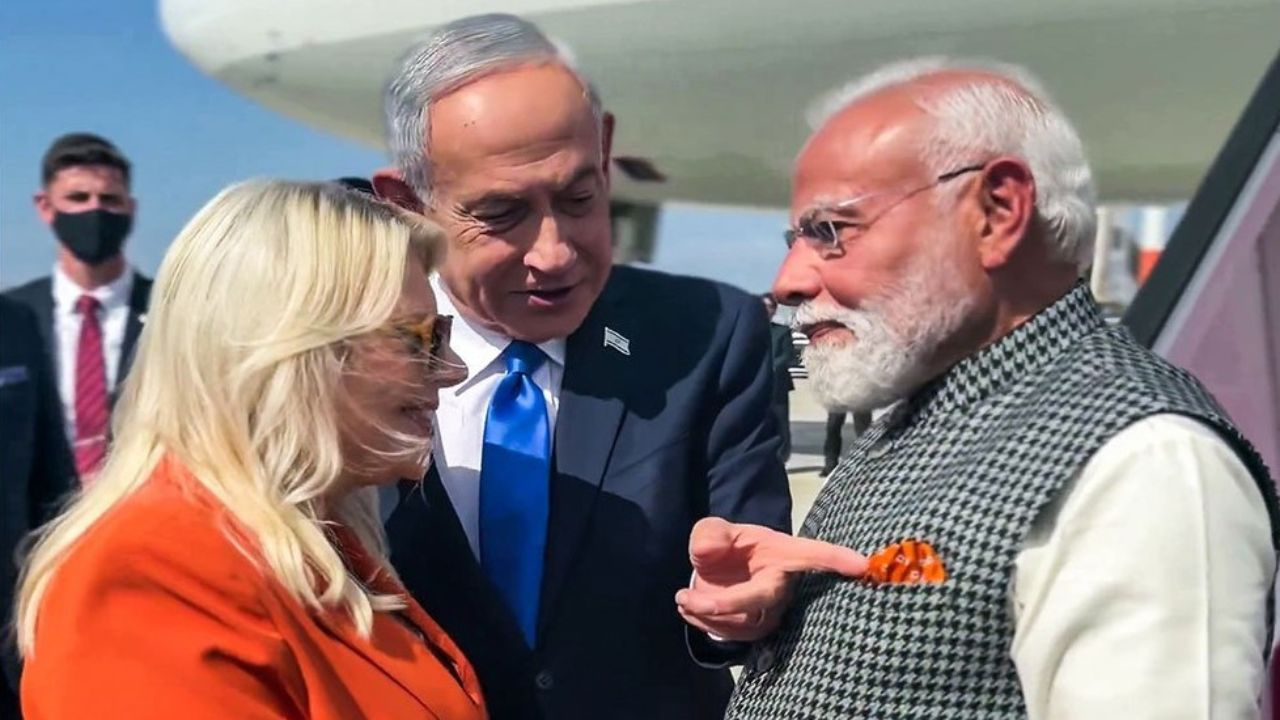 PM Modi Saffron pocket square matching with Sara Netanyahu outfit