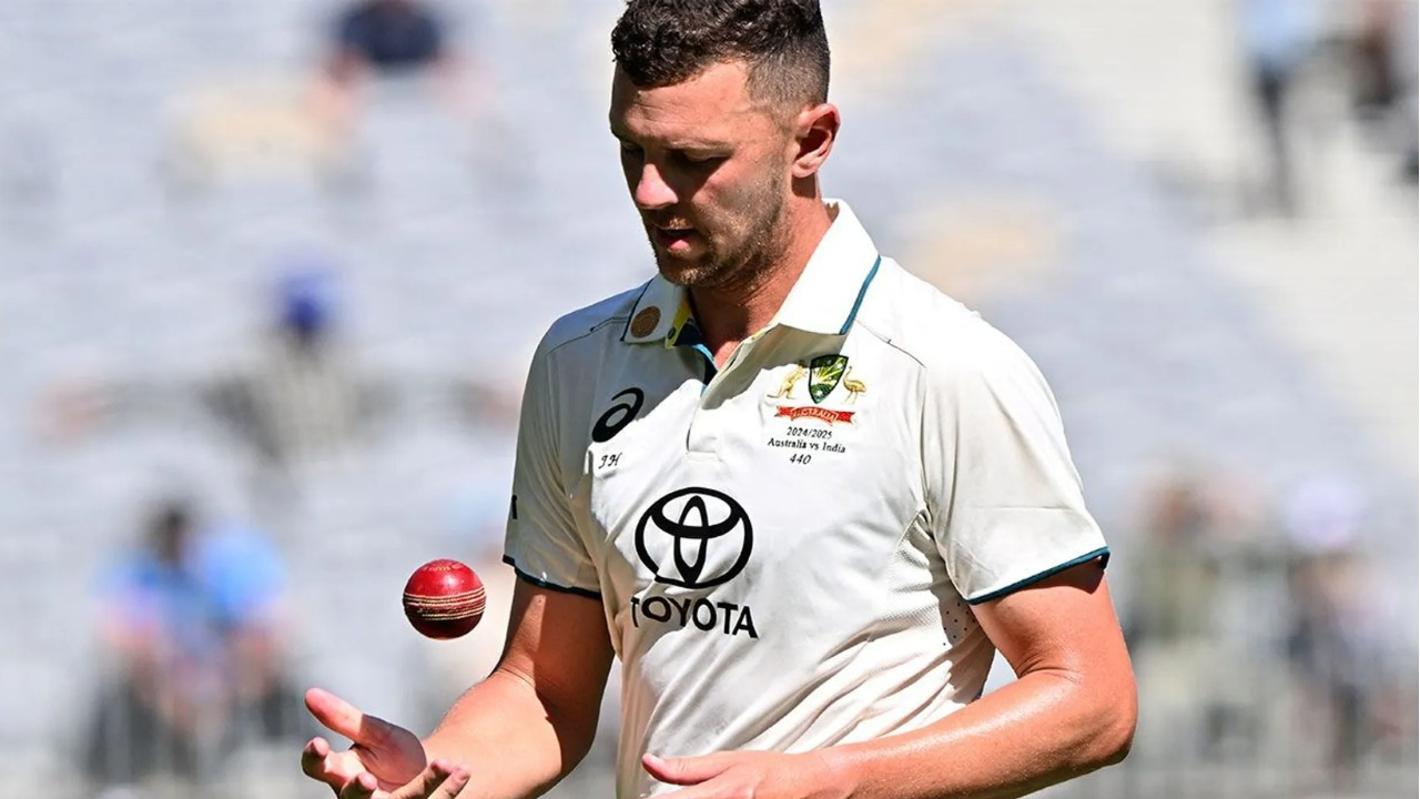 Josh Hazlewood with the Red Ball