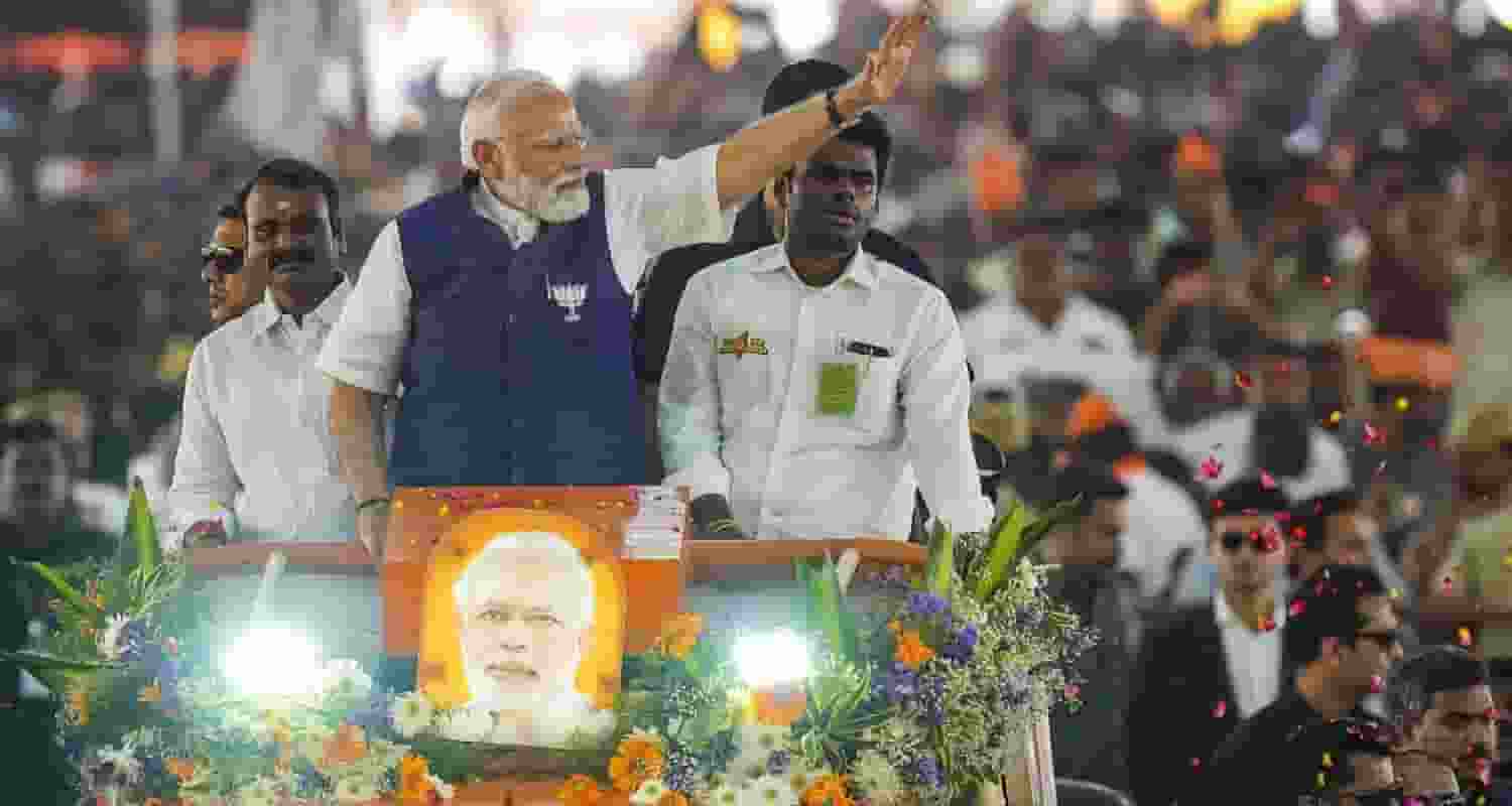 Prime Minister Narendra Modi waves at supporters as he arrives for a public meeting ahead of Lok Sabha elections, in Salem, Tamil Nadu, Tuesday, March 19, 2024.