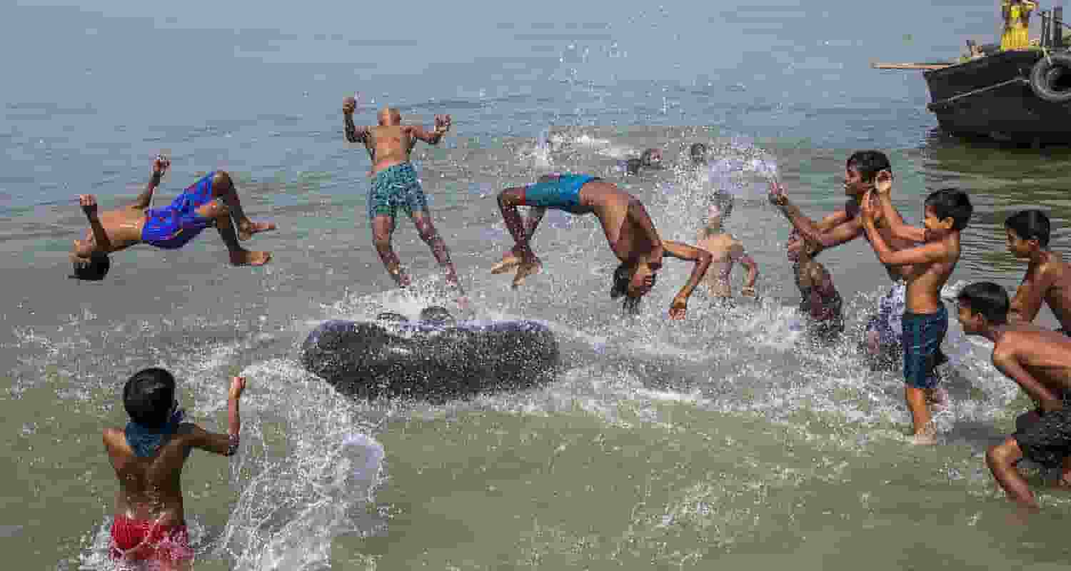 Boys in Nadia showcased their agility with somersaults by the Hooghly River on a Friday morning