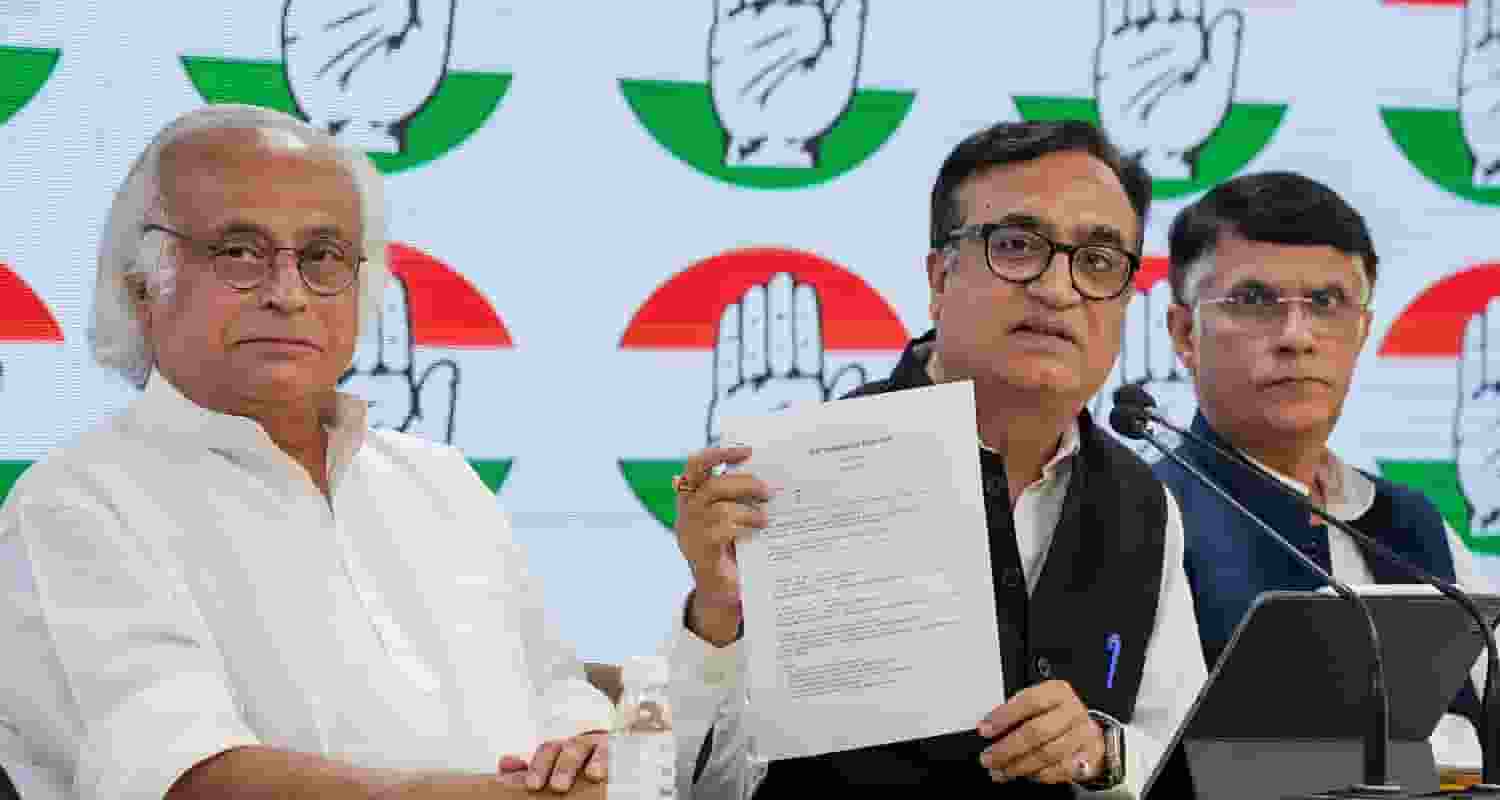 Congress leaders Jairam Ramesh and Ajay Maken during a press conference, in New Delhi, Friday.
