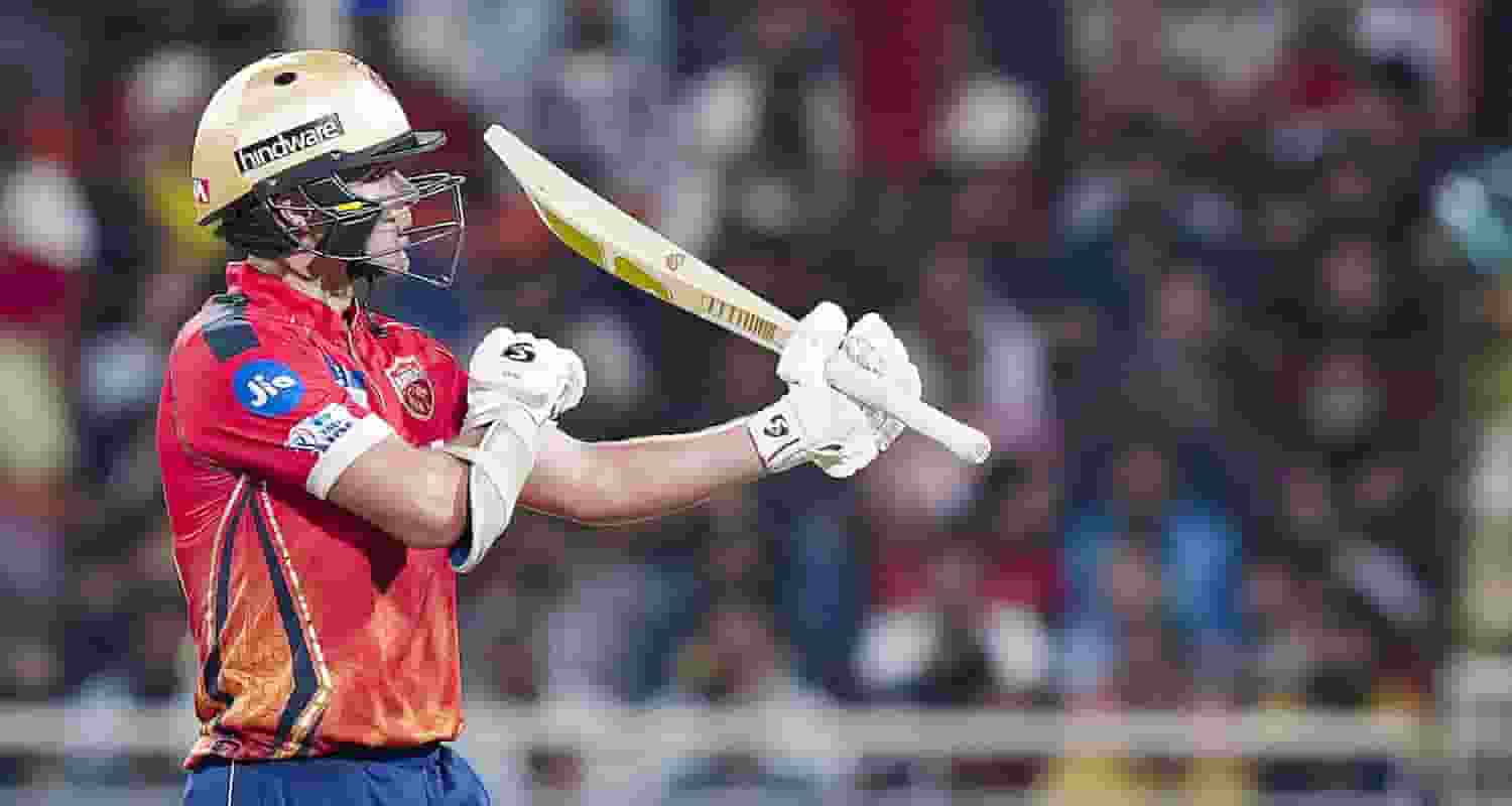 Man of the match Punjab Kings' Sam Curran reacts after completing a half century during the Indian Premier League (IPL) 2024 T20 cricket match between Delhi Capitals and Punjab Kings, at Maharaja Yadavindra Singh International Cricket Stadium, in Mohali on Saturday,