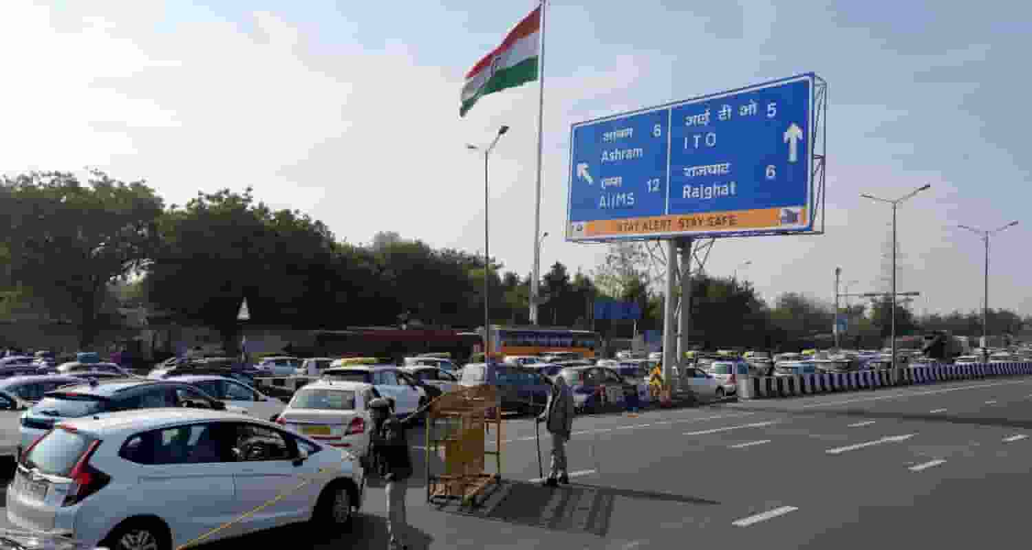 Vehicles stuck in a traffic jam at NH 24 due to a road closure ahead of farmers protest, in New Delhi on Thursday.