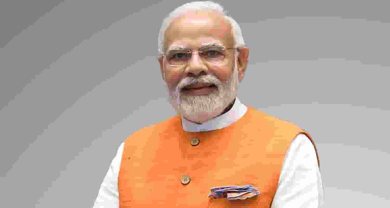 Prime Minister Narendra Modi smiles at the camera