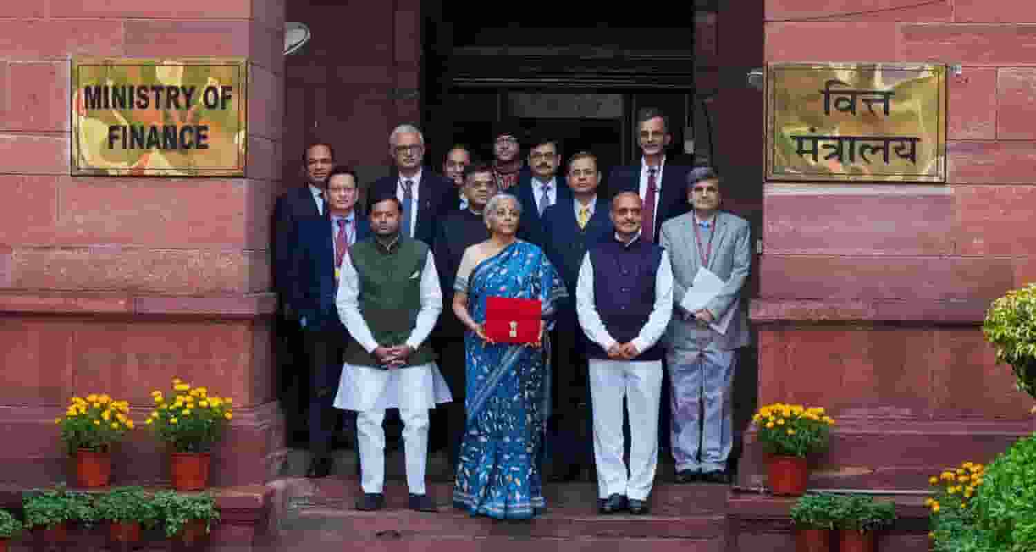 Finance minister Nirmala Sitharaman outside the finance ministry before presenting the budget with secretaries of the ministry, in New Delhi