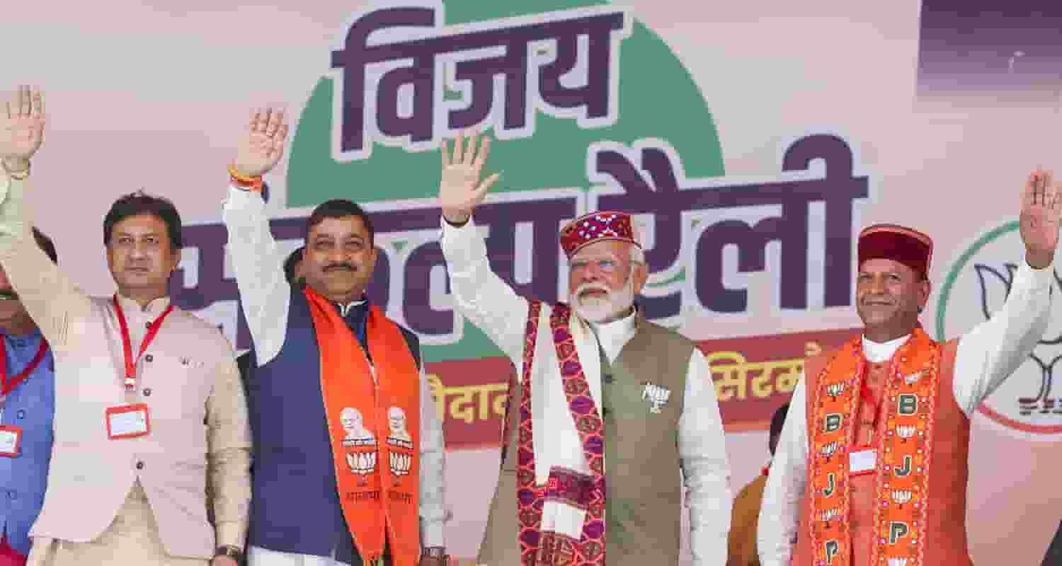 Prime Minister Narendra Modi and Himachal Pradesh BJP President Rajeev Bindal with other party leaders during a public meeting for Lok Sabha elections, in Sirmaur district, Friday. 