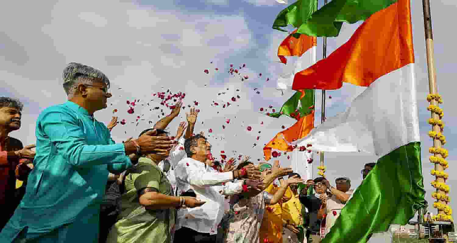 People pay floral tribute to Hindu saint Maneknath on his birth anniversary, at Manek Burj in Ahmedabad, Gujarat