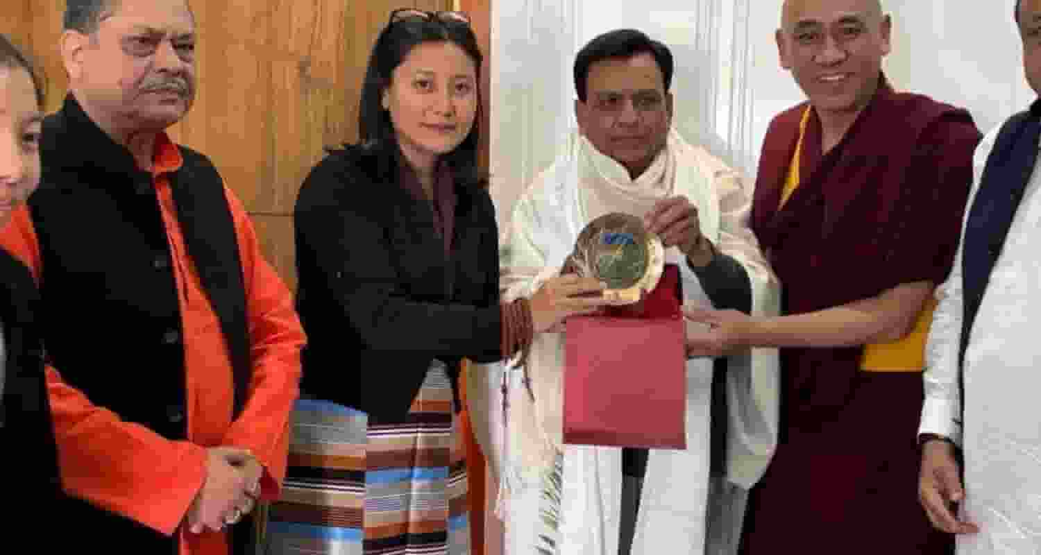 Tibetan MP in exile Tenzin Choezin hands a memento during the India-Tibet friendship meet, India Tibet Friendship forum in Bhopal, Indore, Madhya Pradesh