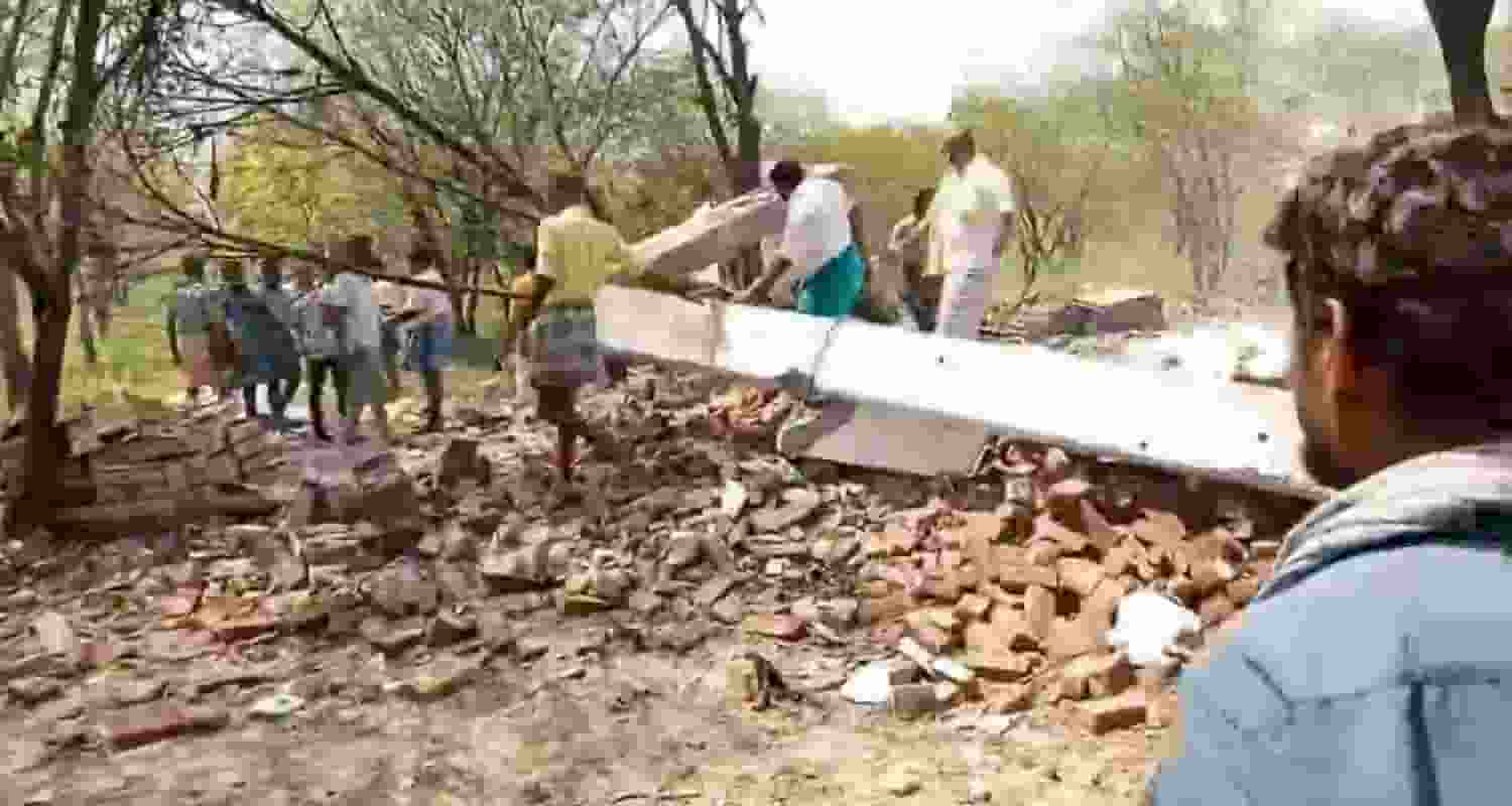 Locals near the fire-cracker factory where a blast took place claiming lives of eight people, in Virudhunagar, Tamil Nadu. 