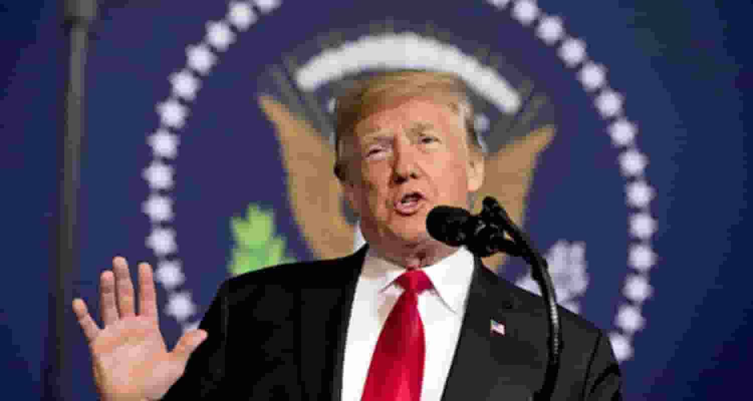 Former US President Donald Trump speaking to reporters