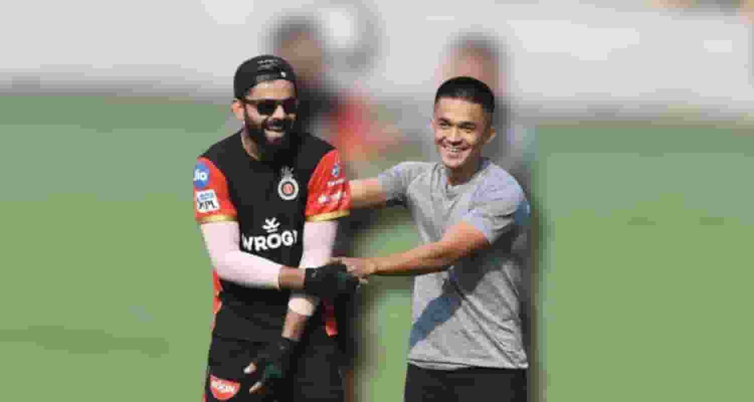 Virat Kohli with Sunil Chhetri. 