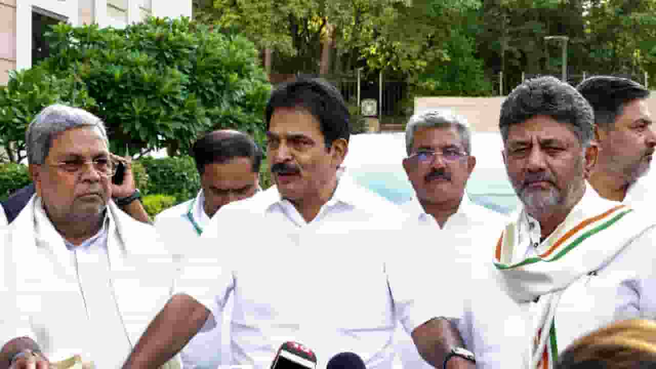 Siddaramaiah with KC Venugopal and DK Shivakumar