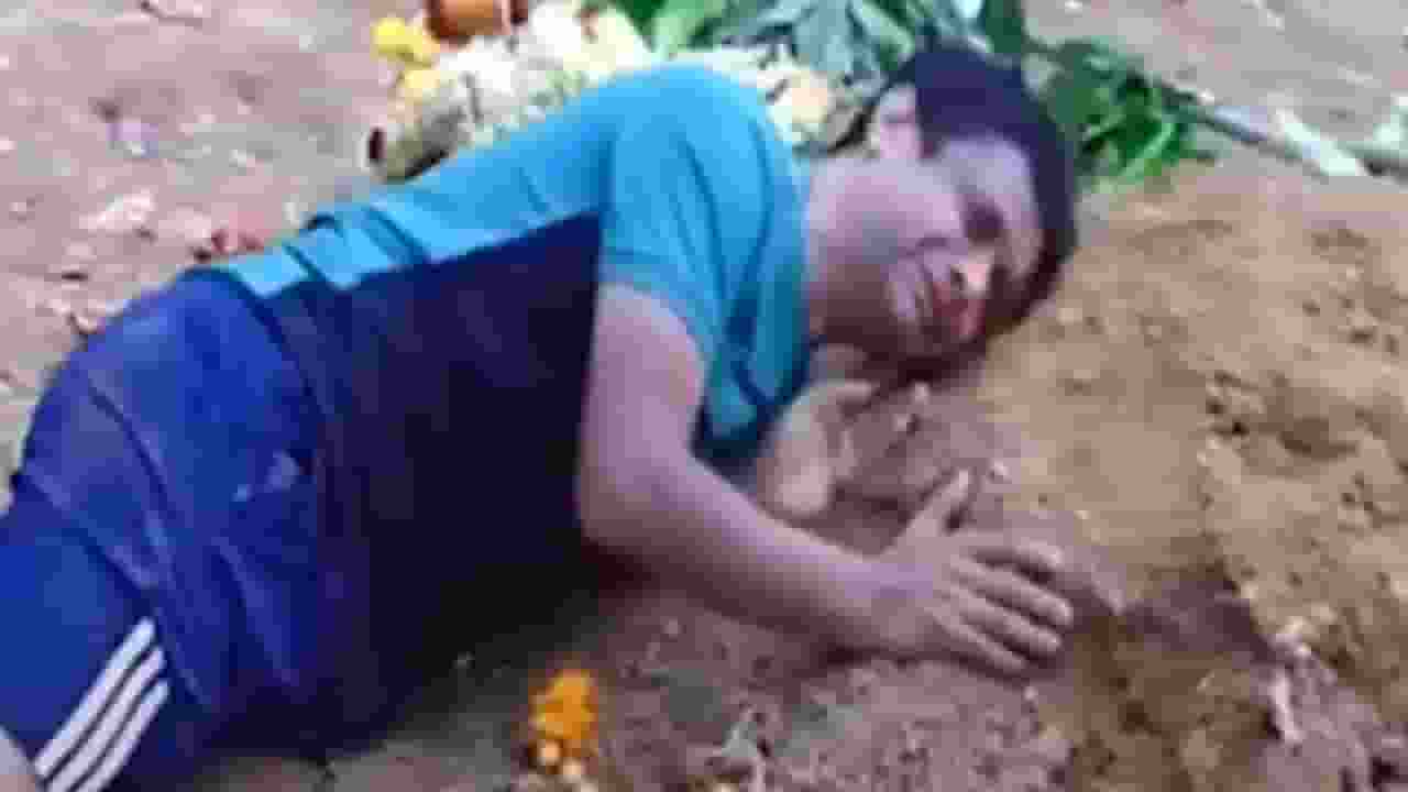 Bengaluru Stampede Father Holds On To Grave Of Son