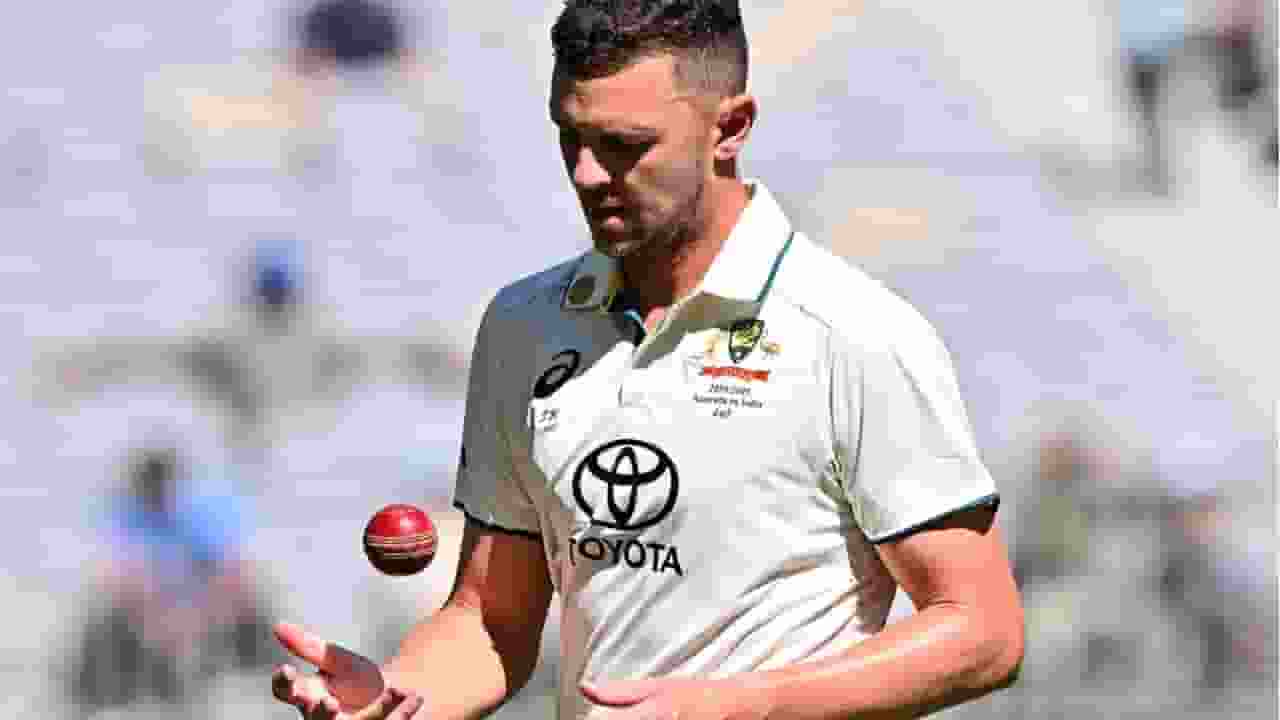 Josh Hazlewood with the Red Ball