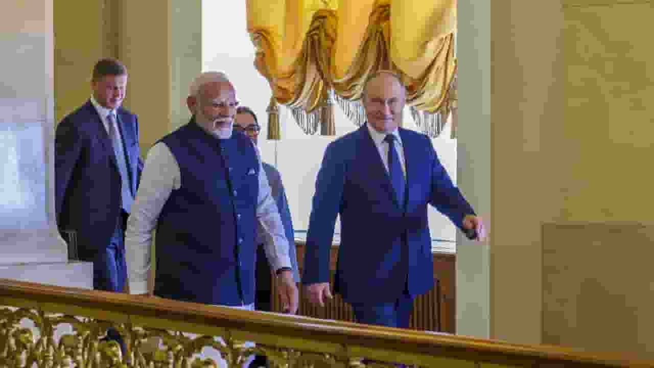 Narendra Modi and Vladimir Putin । Photo Credit: PTI