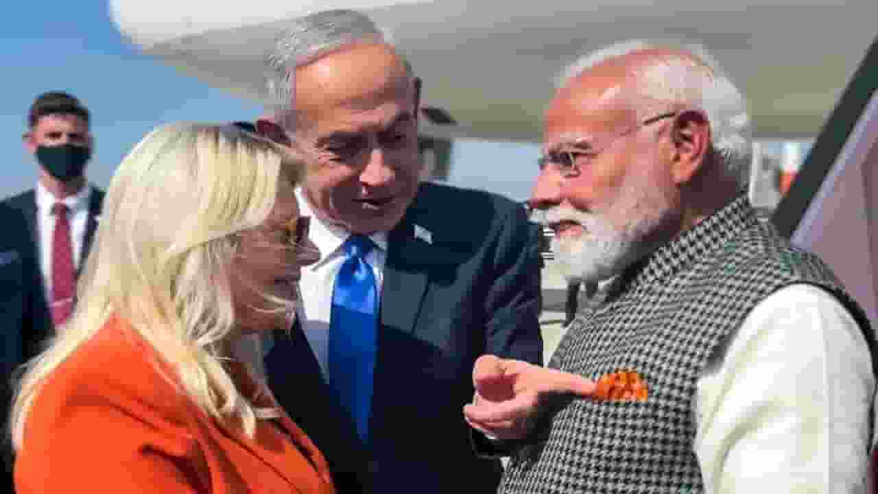 PM Modi Saffron pocket square matching with Sara Netanyahu outfit